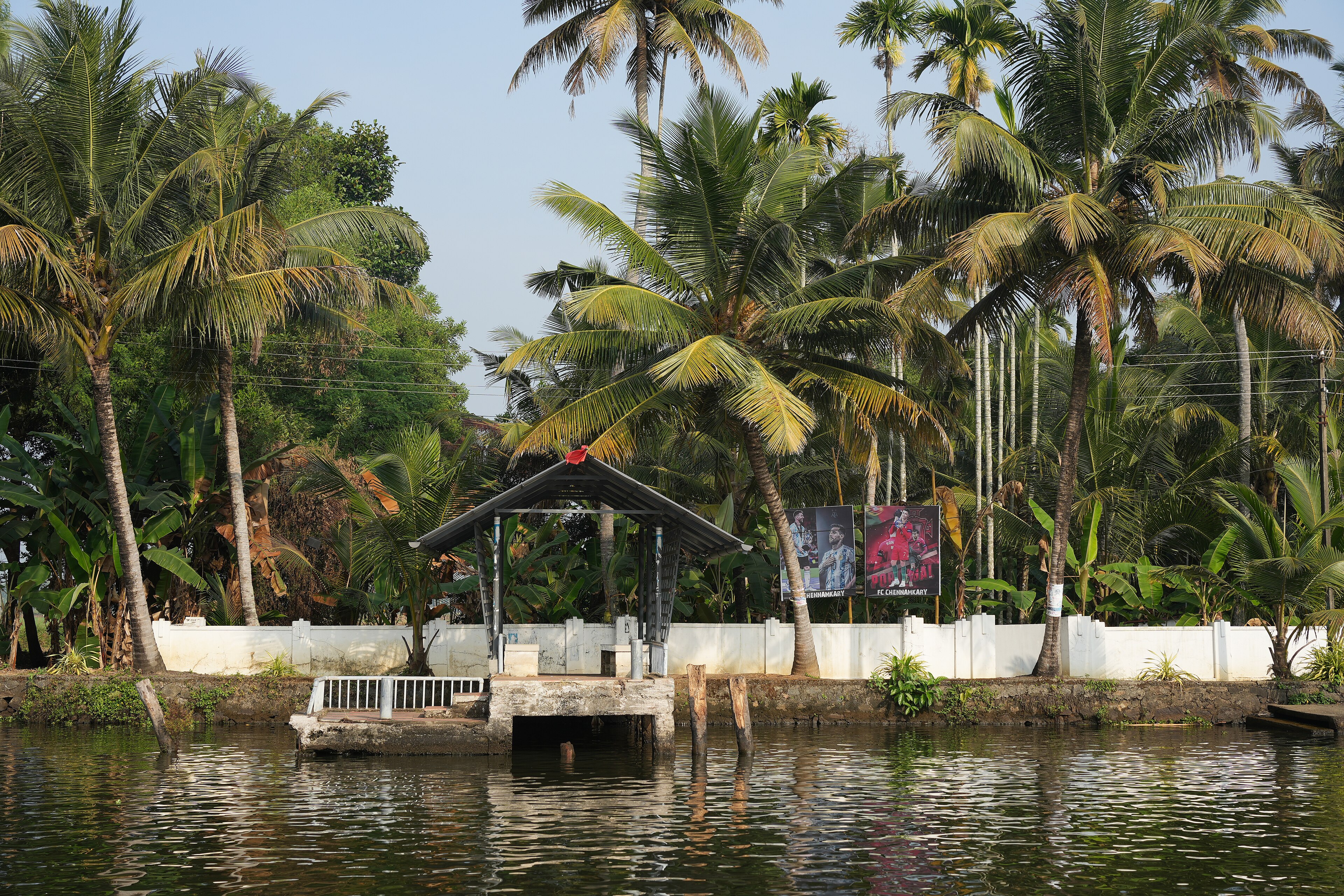 Kettuvallam houseboat cruising the Alleppey backwaters at golden hour